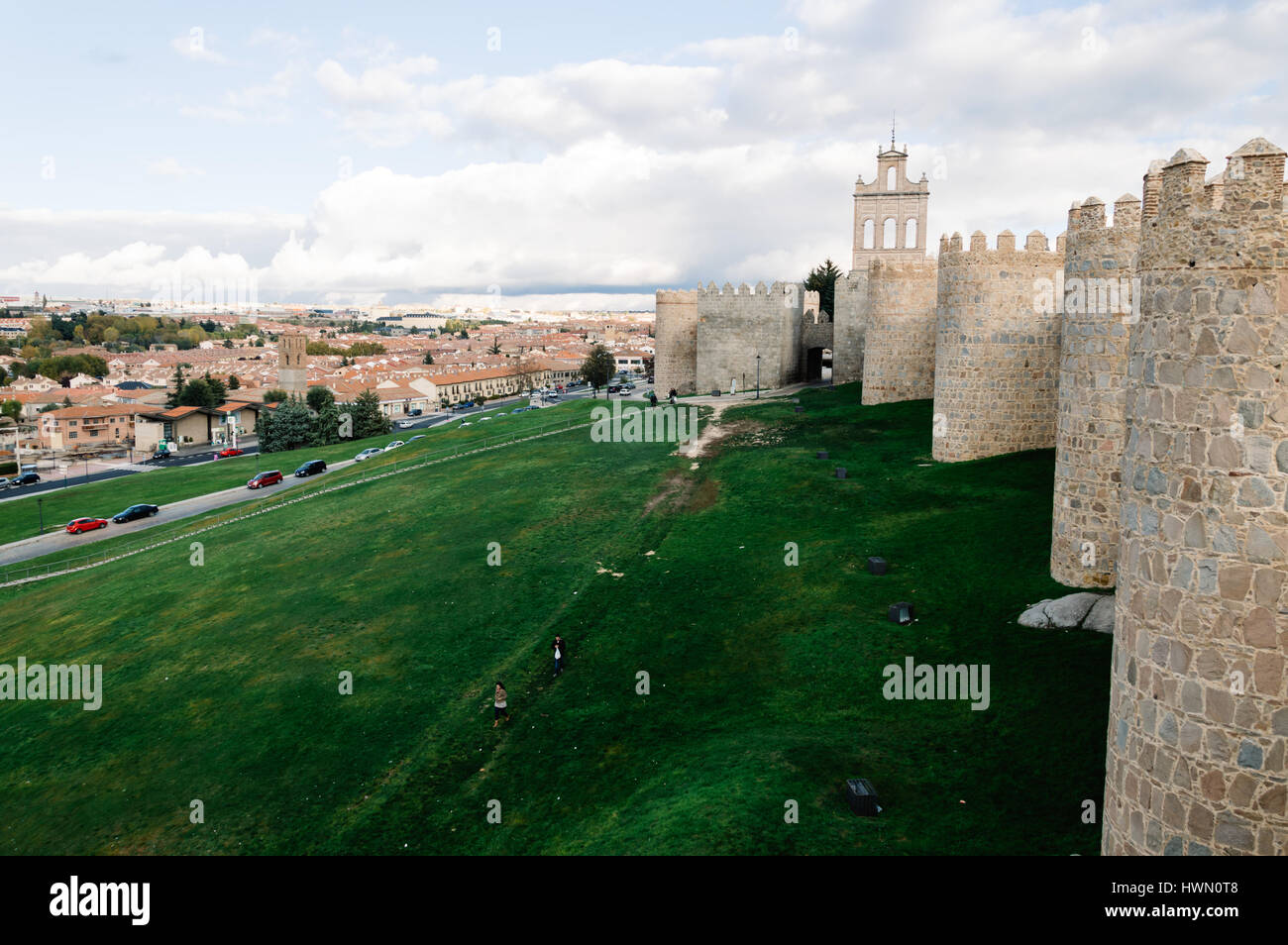 Avila, Spain - November 11, 2014:  Cityscape of Avila from Medieval Walls a cloudy day at sunset. The old city  and its extramural churches were decla Stock Photo