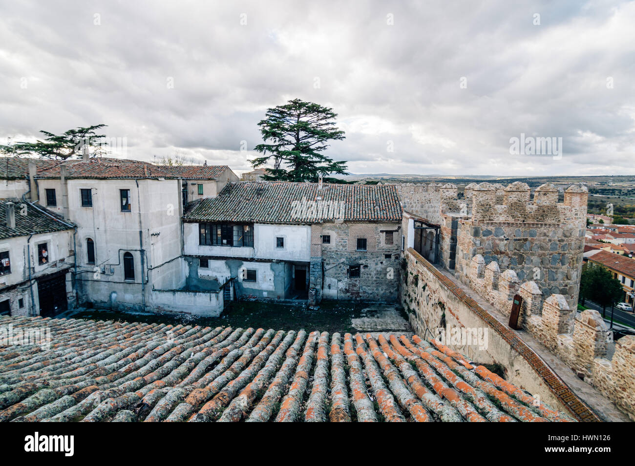 Avila, Spain - November 11, 2014:  The Medieval Walls of Avila. The old city of  and its extramural churches were declared a World Heritage site by UN Stock Photo