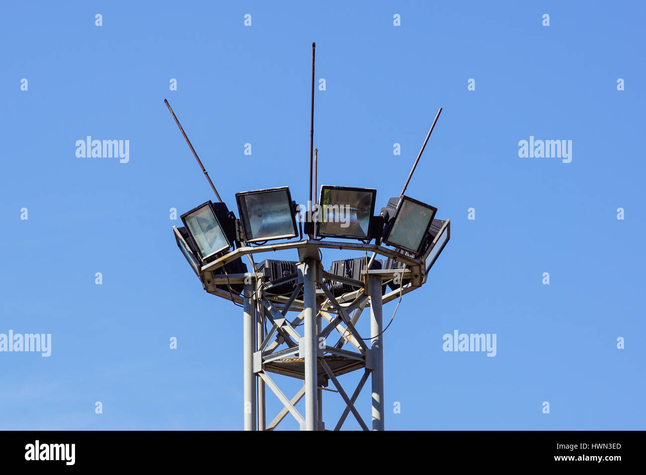 Lighting tower with lamps at stadium. Lighting fixtures at stadium