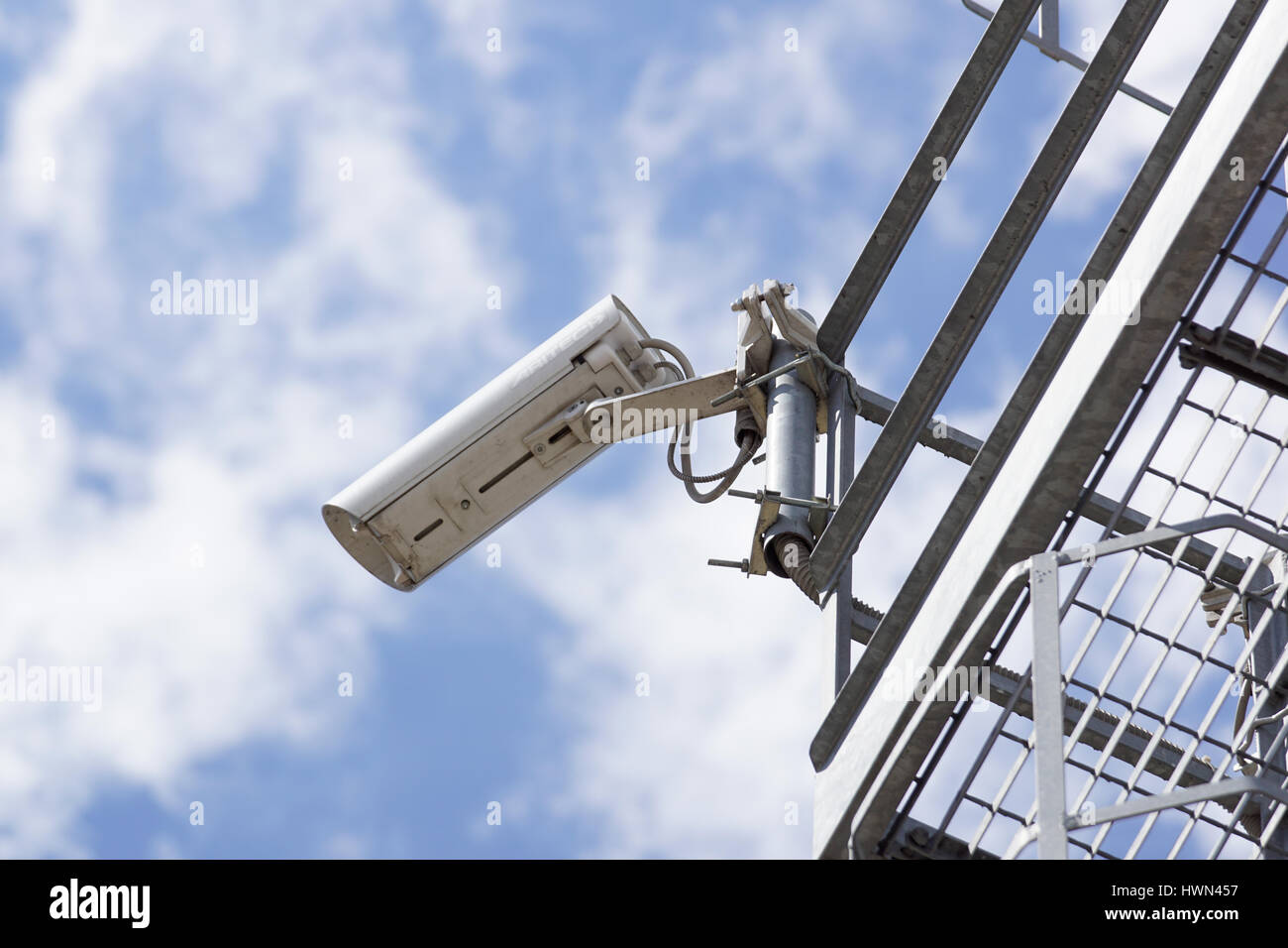 security cctv cameras with blue sky background Stock Photo - Alamy