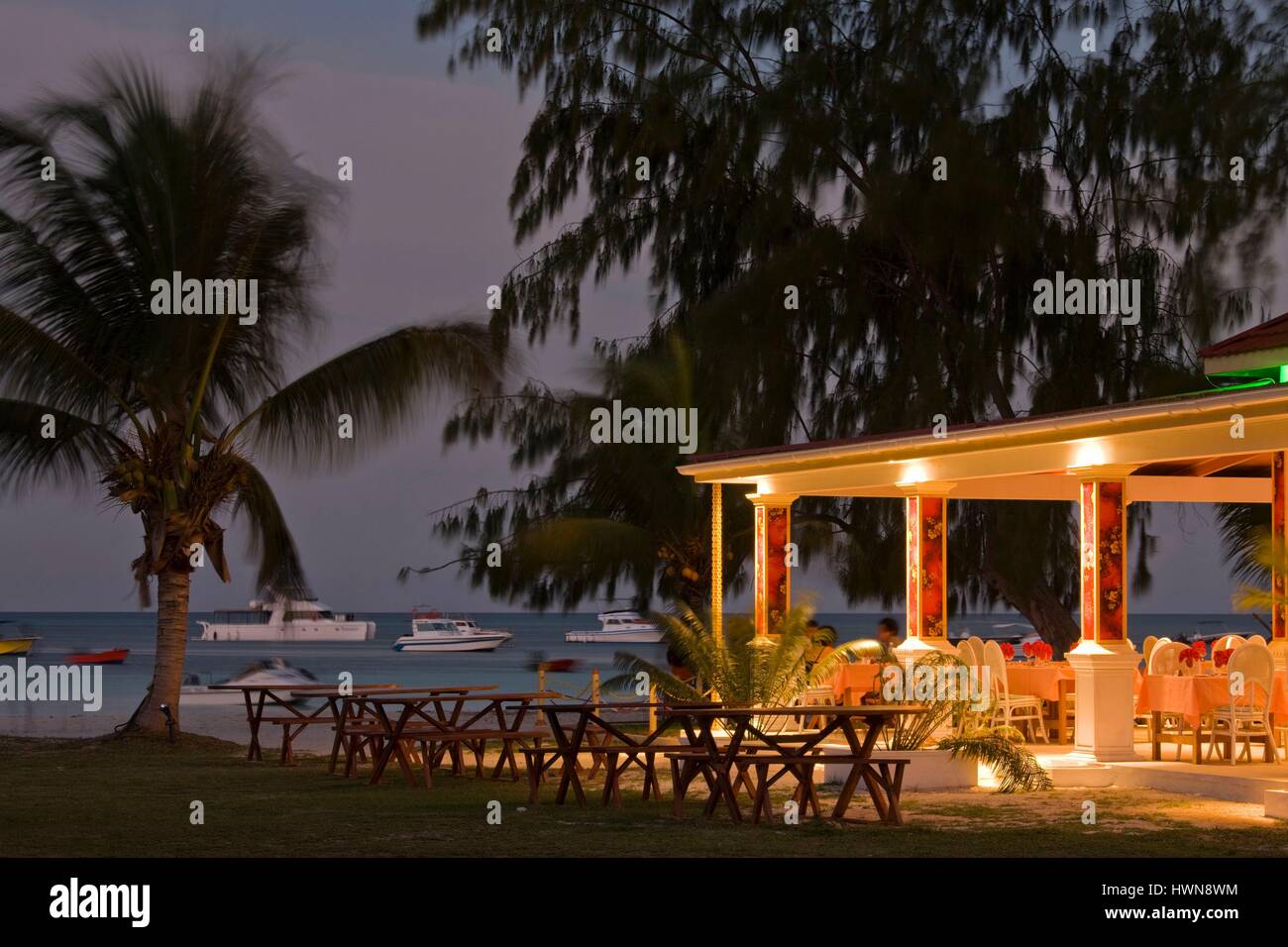 Seychelles, Praslin Island, Anse Volbert, outdoor restaurant, evening Stock Photo