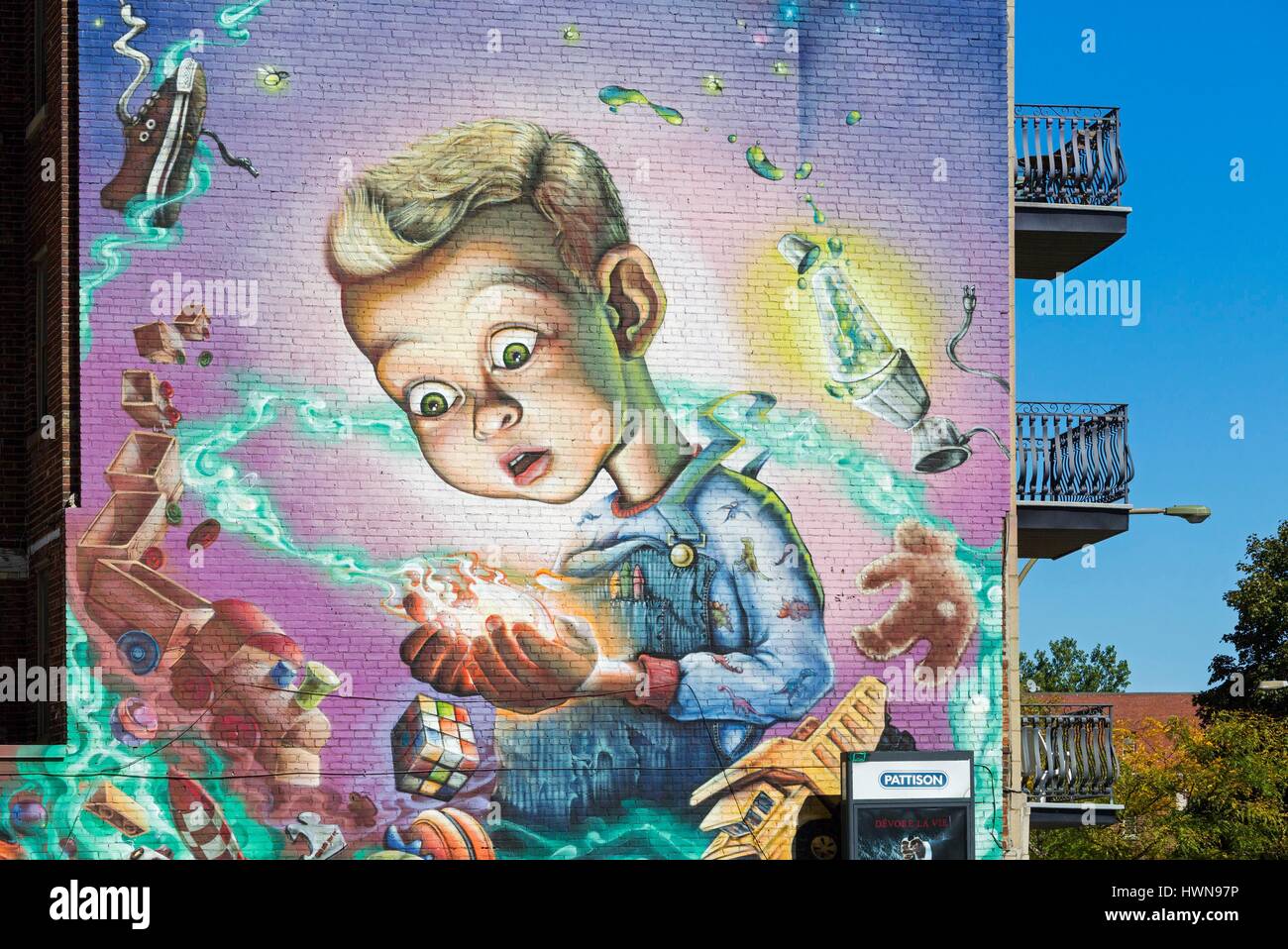 Canada, Province of Quebec, MontrealWhen I grow up, I will be a child by the collective A'Shop in 2012 Height from more than 13 meters, this giant mural suggests to passers-by to encourage game and creativity for their children and themselves Stock Photo