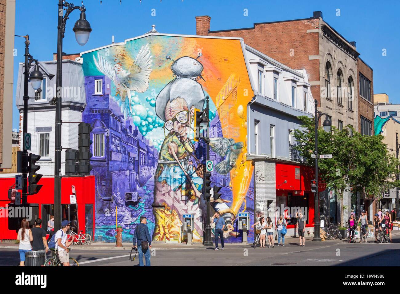 Canada, Province of Quebec, Montreal Granny by A'Shop for the Mural Festival 2013 This old lady was totally integrated into the daily life of Montrealers. Like Saint-Laurent Boulevard, she is aged, but always rebellious and colorful Stock Photo