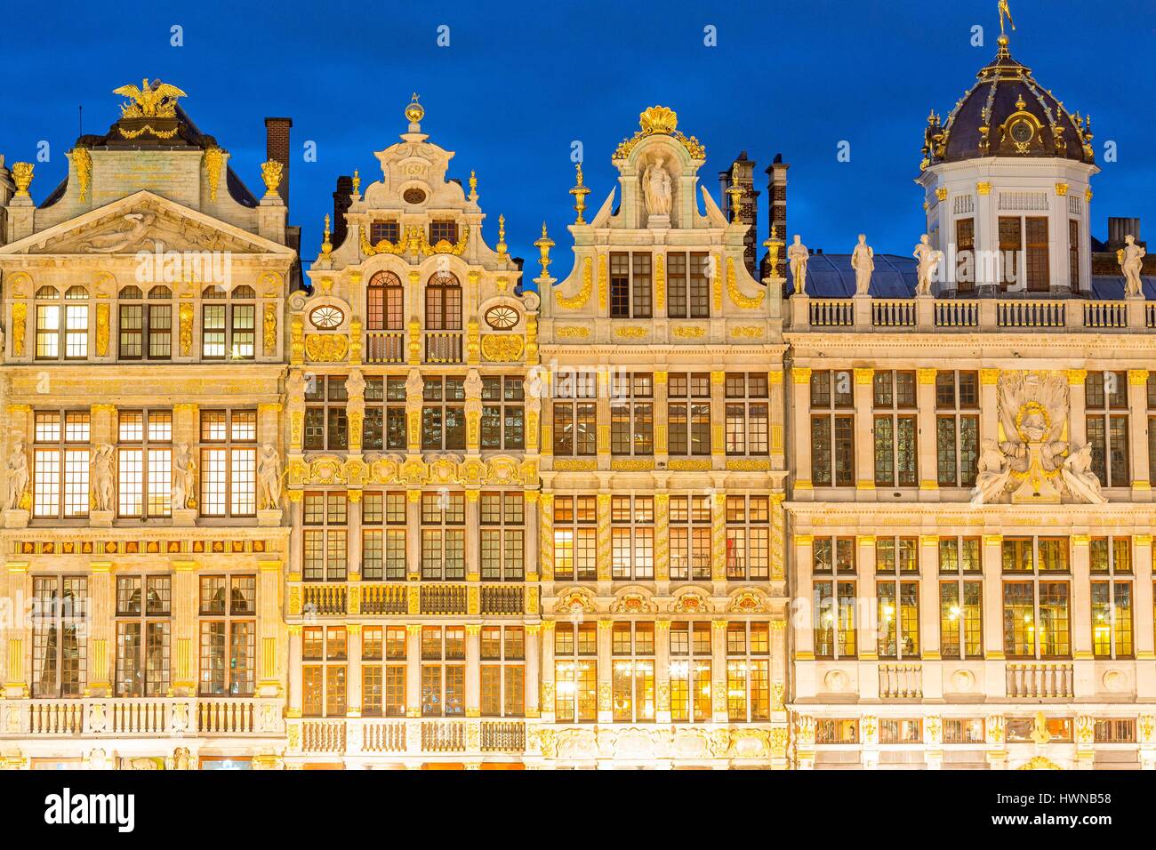 Belgium, Brussels, Grand Place (Grote Markt), listed as World Heritage by UNESCO, houses of the 17th century guilds, from left to right, Maison de la Louve, Maison du Sac, Maison de la Brouette and Maison du Roi d'Espagne Stock Photo