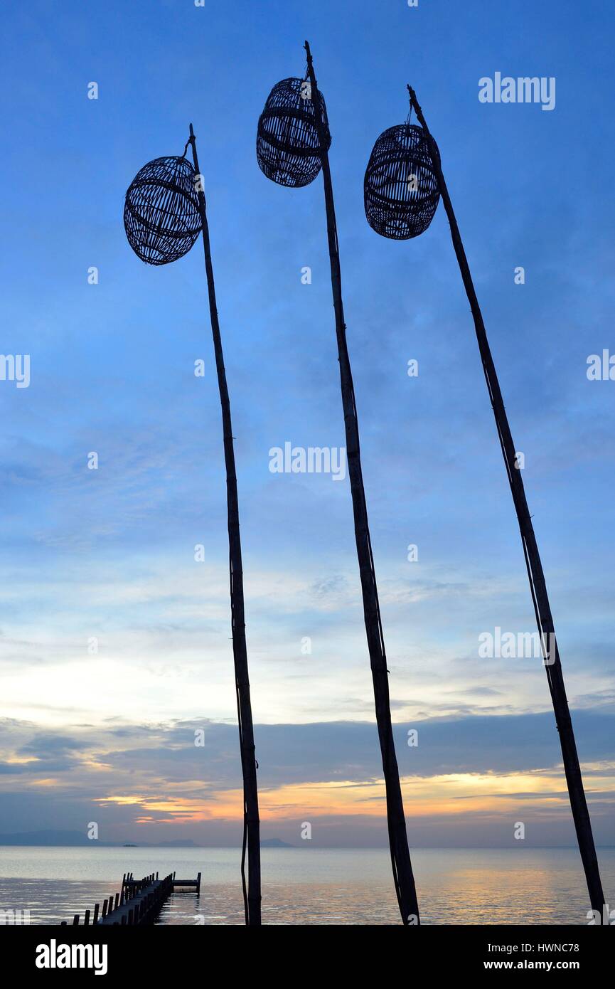 Cambodia, Krong Kep Province, Kep village, Sailing Club warf at sunset, lamps Stock Photo