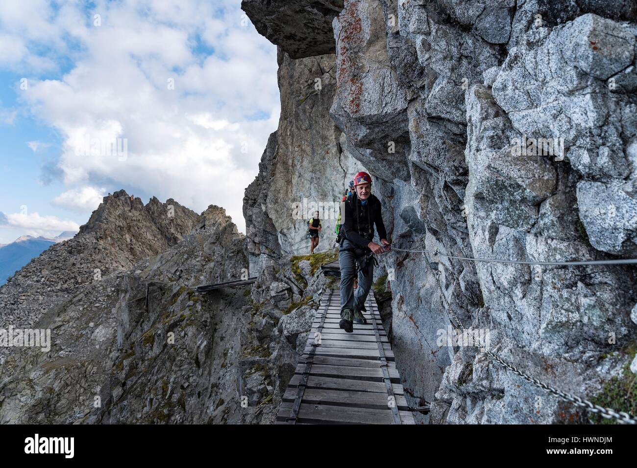 Italy, Lombardy, Temu, Hikers on via ferrata named Sentiero dei Fiori Stock  Photo - Alamy