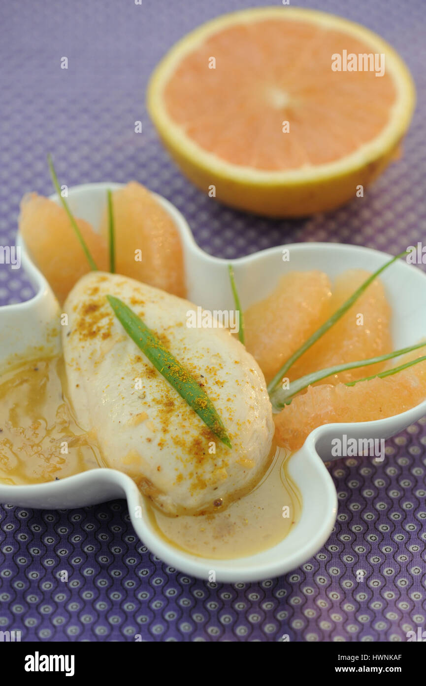 Poulet mariné au pamplemousse Stock Photo