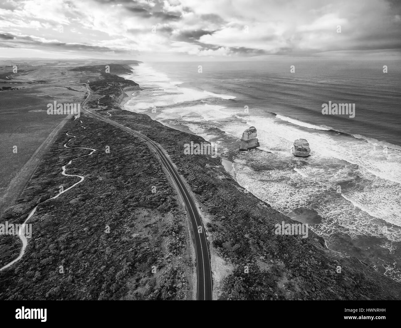 Black and white aerial view of the Great Ocean Road with Gog and Magog rock formations, Victoria, Australia Stock Photo