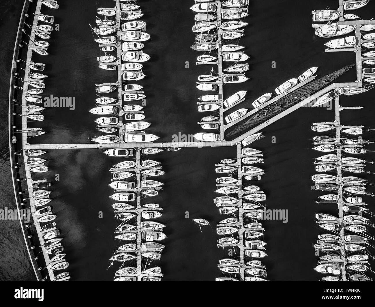 Looking straight down at boats moored at Sandringham Marina. Black and white image, Melbourne, Victoria, Australia Stock Photo