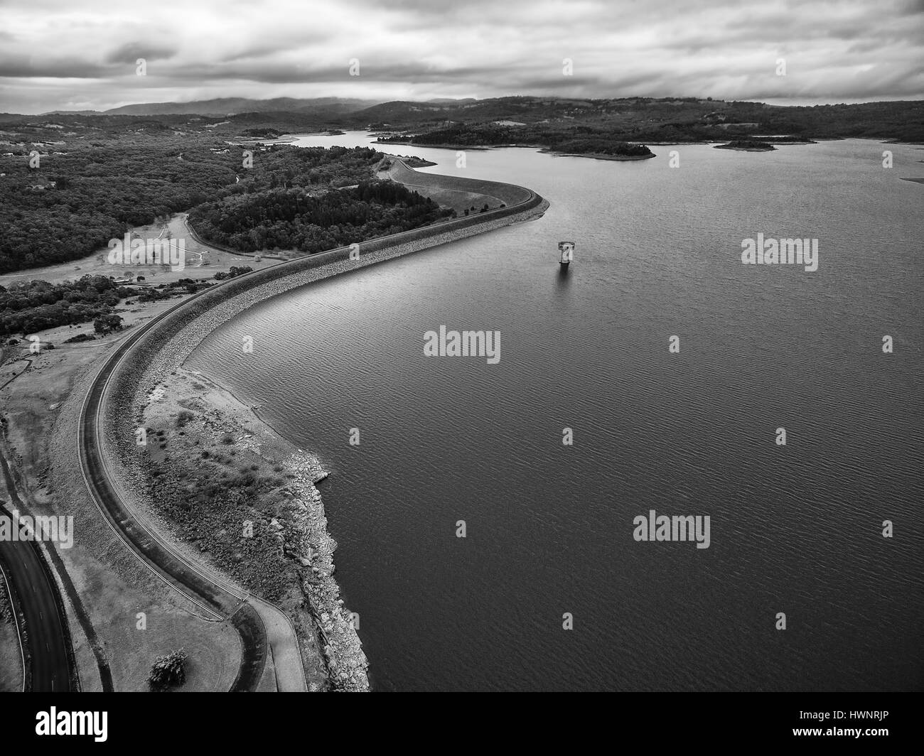 Black and white aerial view of Cardinia Reservoir lake and rural surroundings. Melbourne, Victoria, Australia Stock Photo