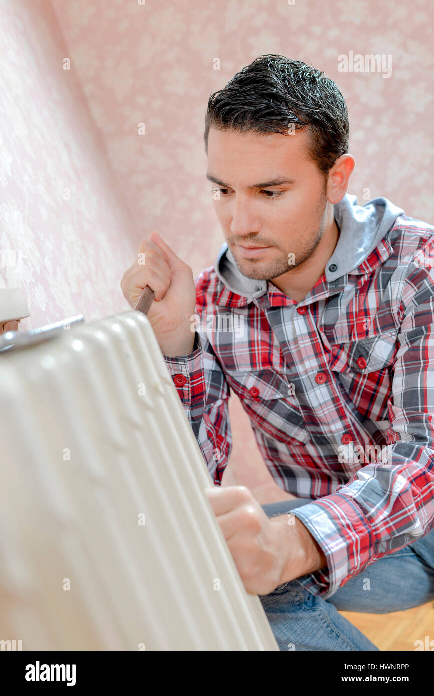 Repairing a radiator Stock Photo Alamy