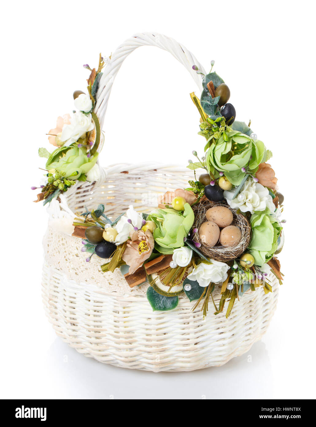 decorated empty wicker basket on a white background Stock Photo - Alamy