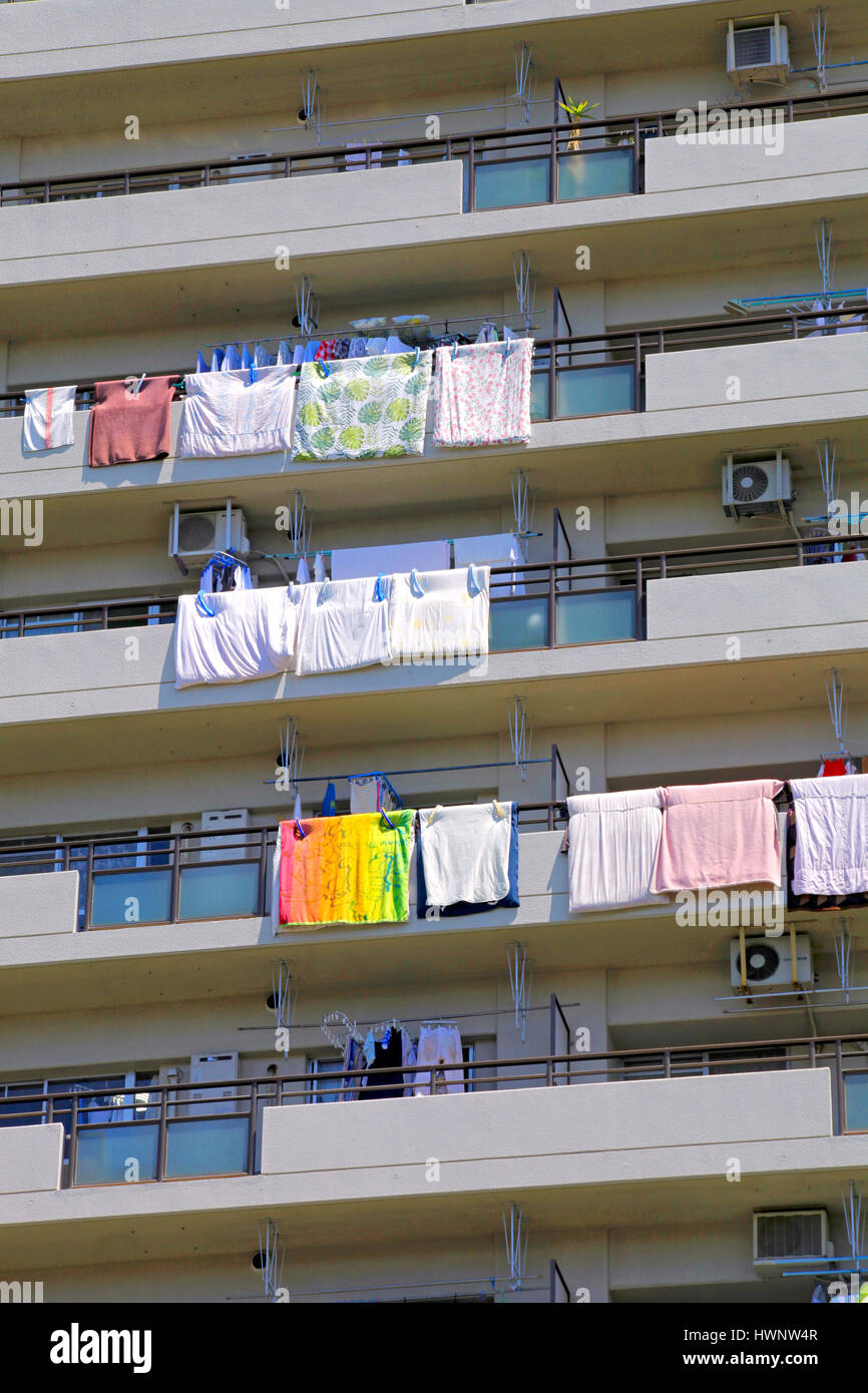 Airing Out Futons on Balconies of Apartment House in Tokyo Japan Stock