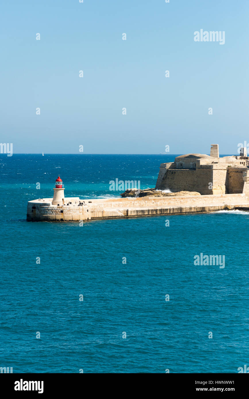 A view into the Grand Harbour and harbour entrance and fortifications at at Valetta Malta Stock Photo