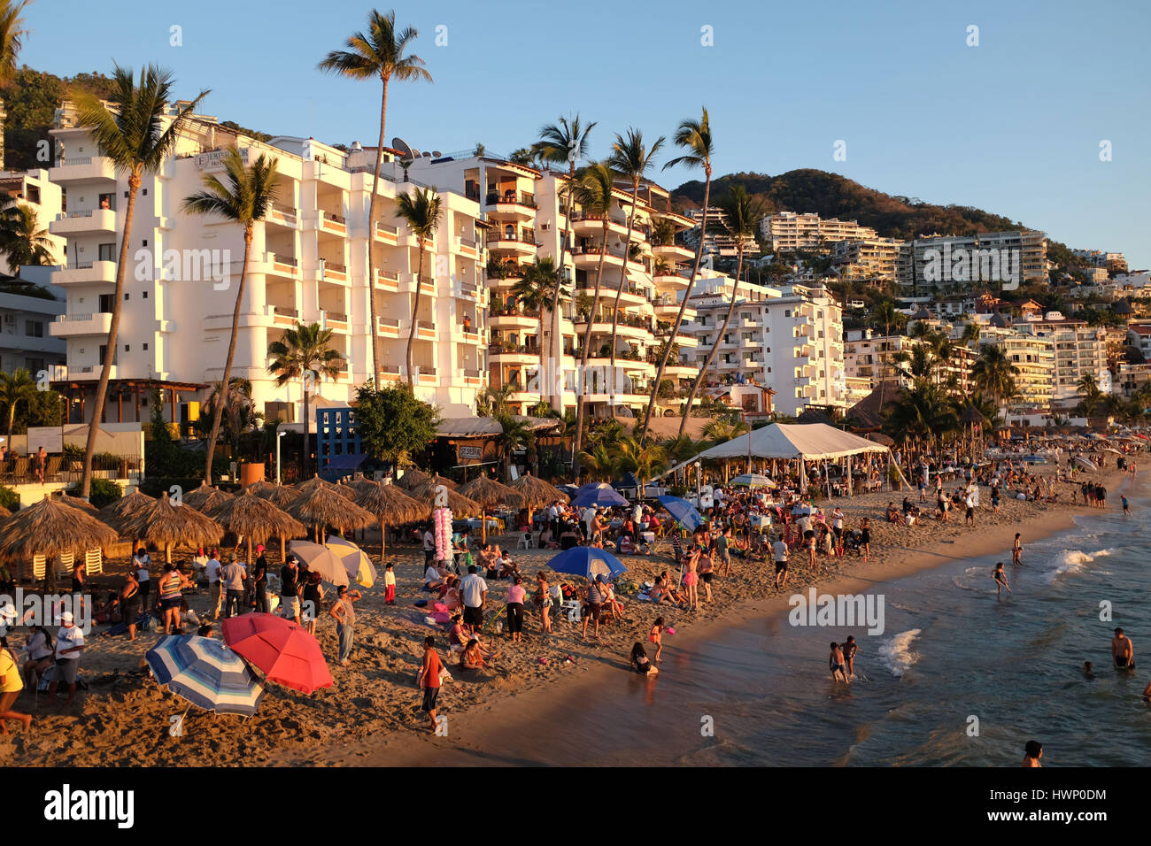 Mass tourism on beach in Puerto Vallarta, Mexico Stock Photo