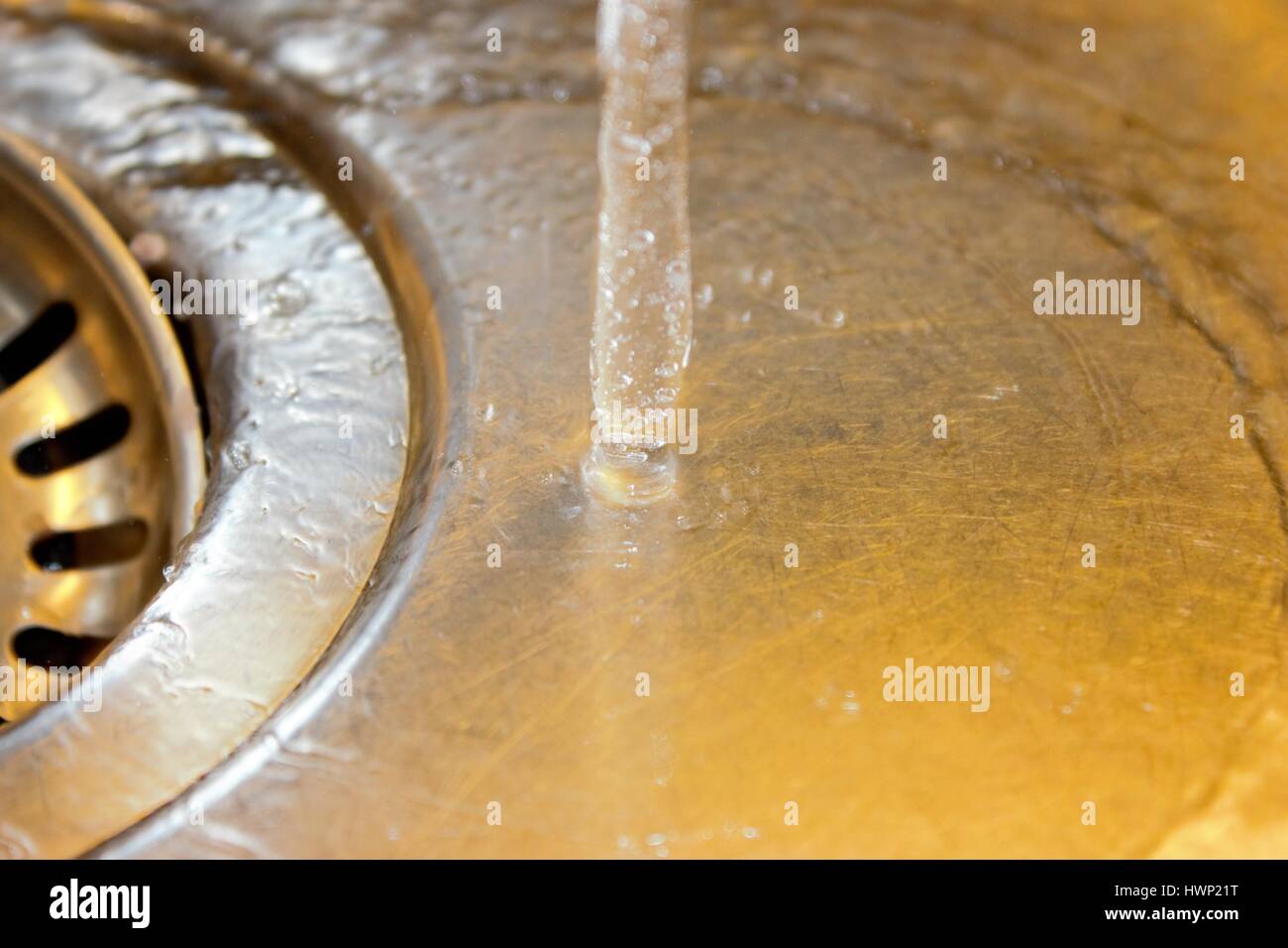 Flowing water in a kitchen sink, closeup Stock Photo Alamy