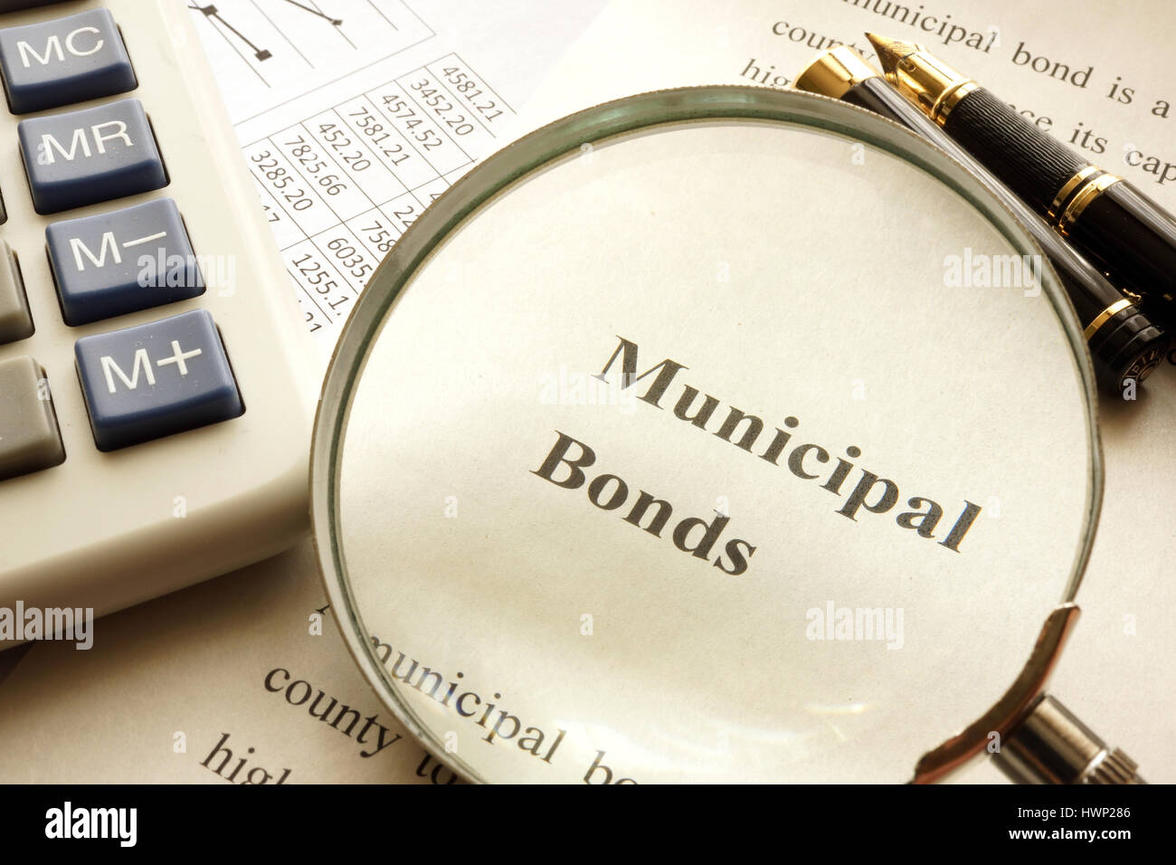 Document with title municipal bond on a table. Stock Photo