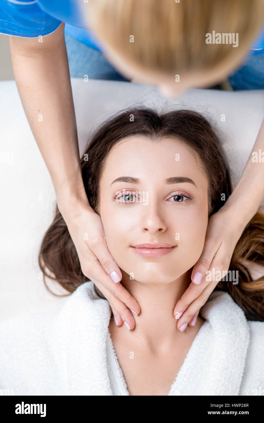 Woman Getting Facial Massage Stock Photo Alamy