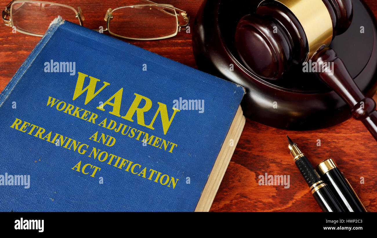 Book with title Worker Adjustment and Retraining Notification Act (WARN). Stock Photo