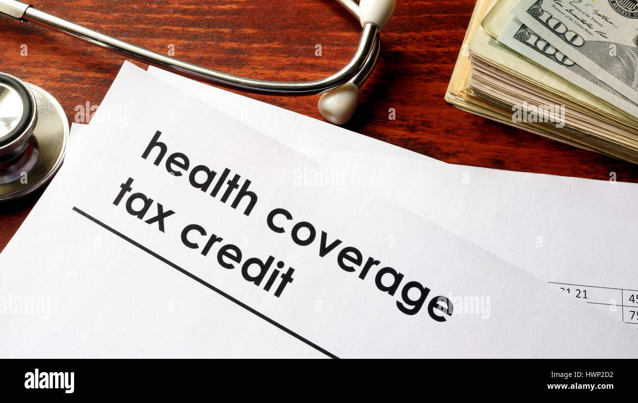 Document with title health coverage tax credit. Stock Photo