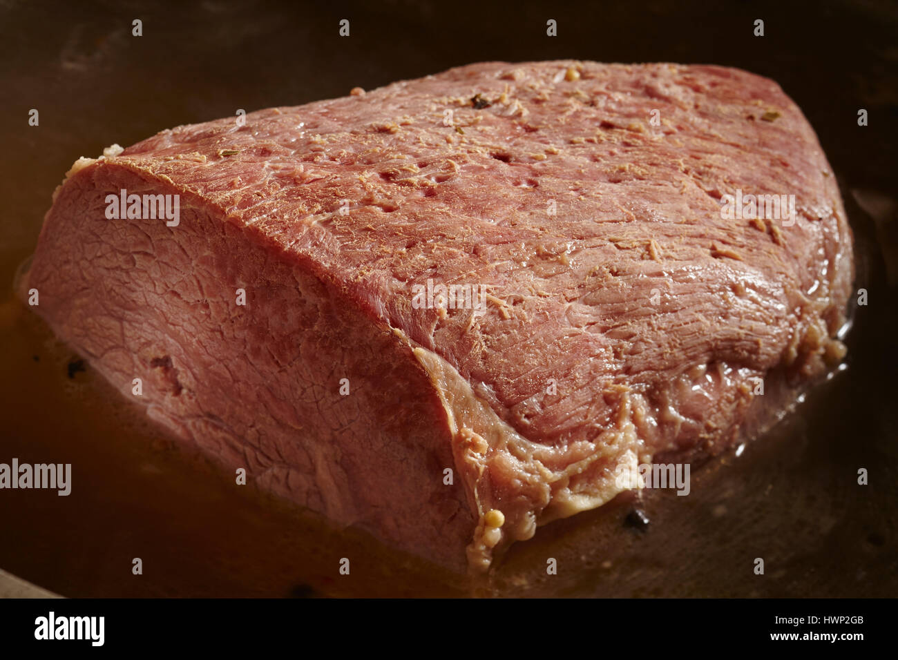 A salted eye round of beef, called a "corned beef" in the USA Stock Photo Alamy