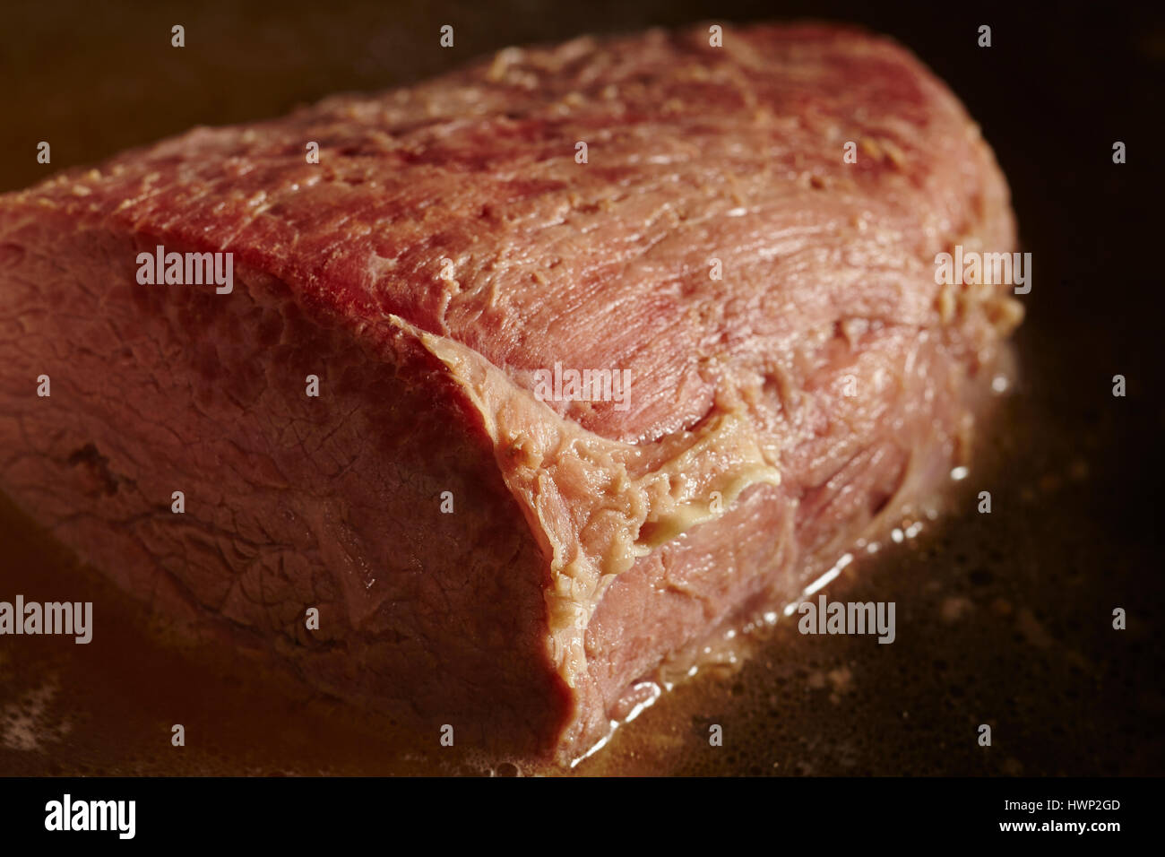 A salted eye round of beef, called a "corned beef" in the USA Stock Photo Alamy