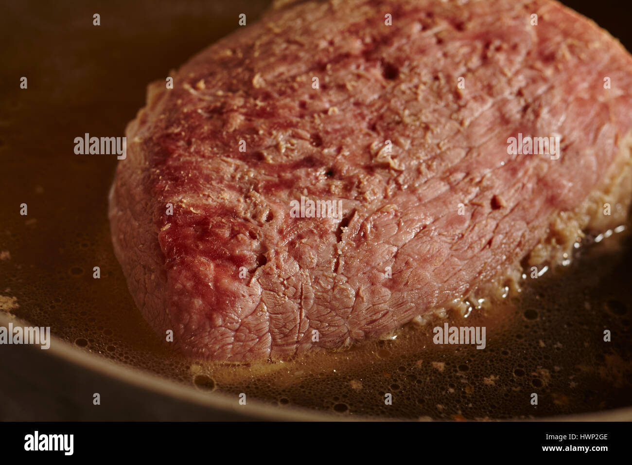 A salted eye round of beef, called a "corned beef" in the USA Stock