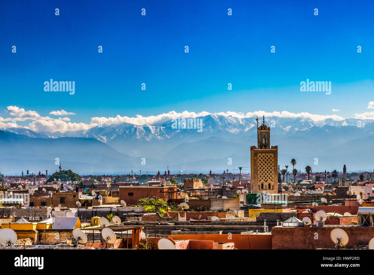 Roof tops of Marrakech, Morocco with Atlas mountains in the distance Stock Photo