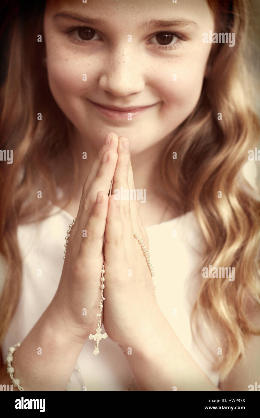 Portrait of a girl on her first holy communion day Stock Photo