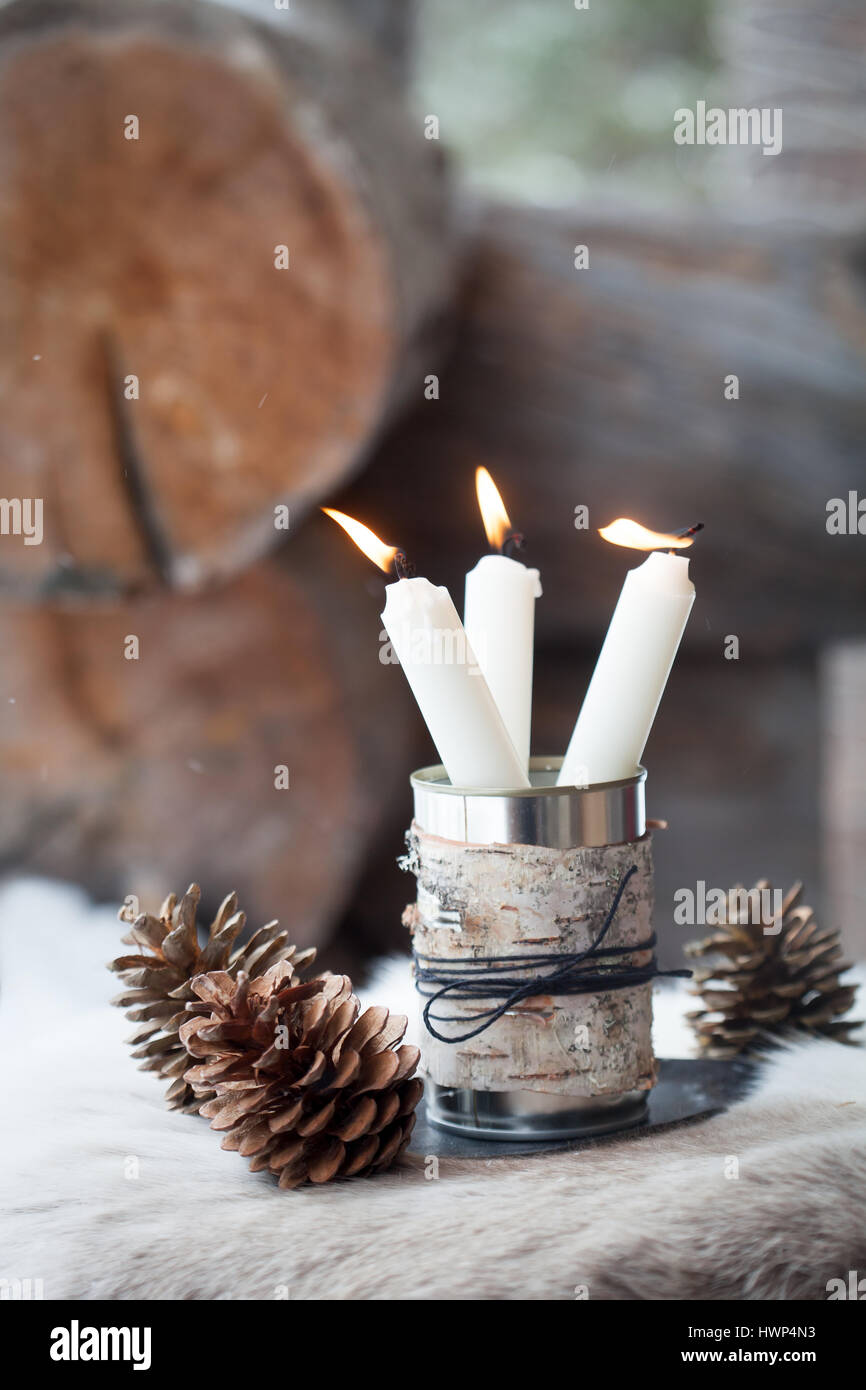 Candles outdoors in tin can Stock Photo Alamy