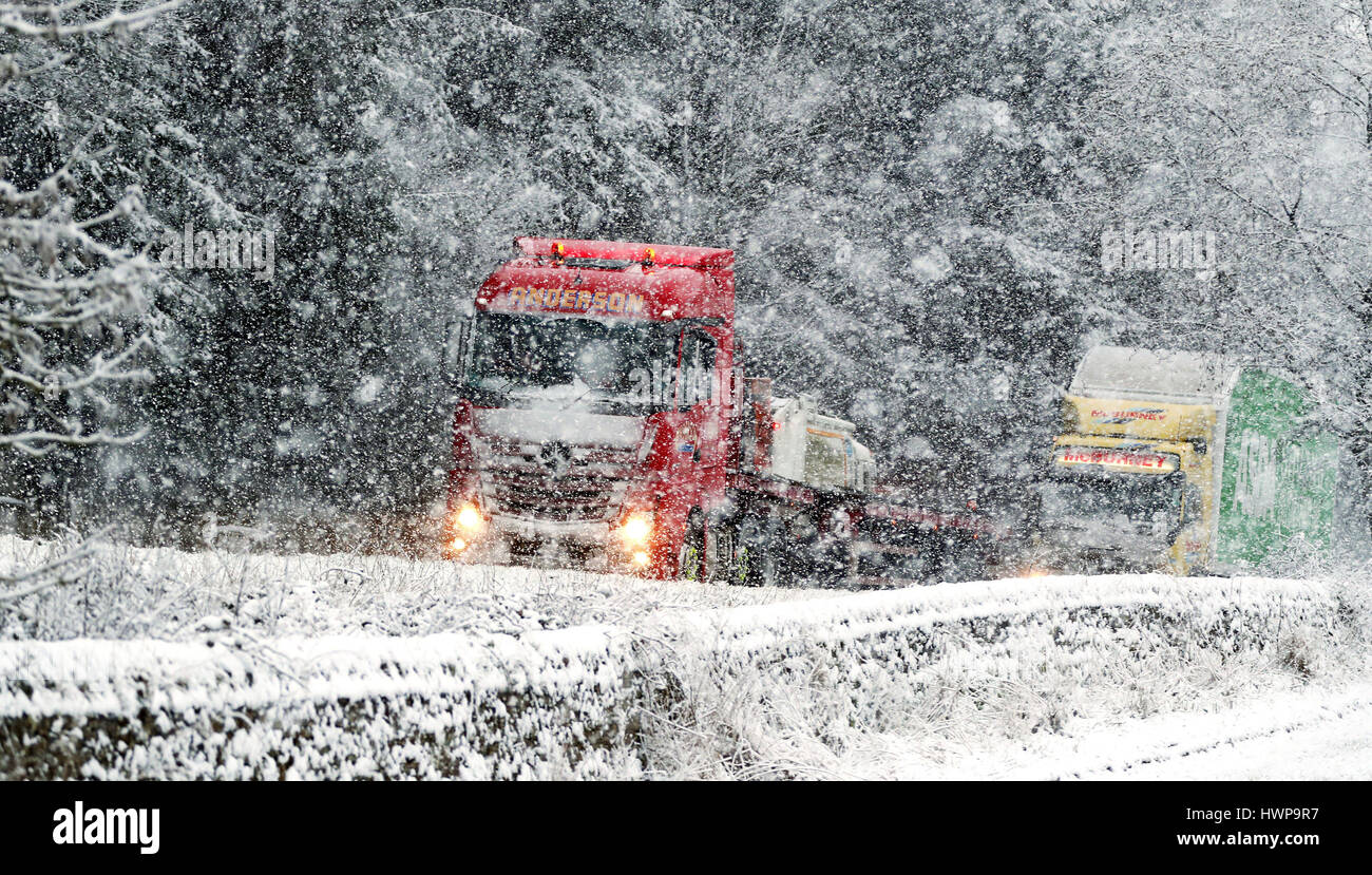 A lorry drives through the snow on the A69 near Hexham in ...