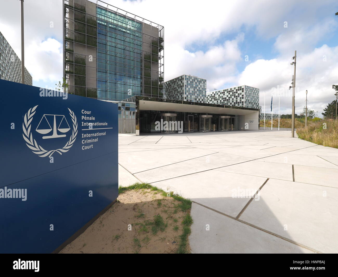 The Hague, Netherlands - July 5, 2016: The International Criminal Court forecourt, entrance and sign at the new 2016 opened ICC building. Stock Photo