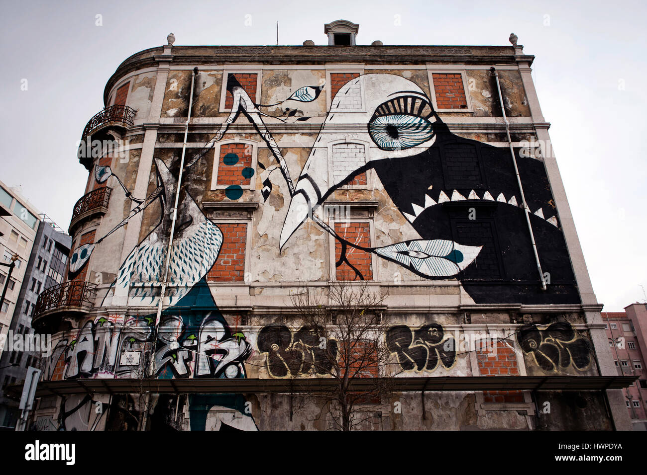 A Street art painting by Lucy McLauchlan on a wall in Lisbon, Portugal. These walls are from the Crono art initiative bringing one of the very talente Stock Photo