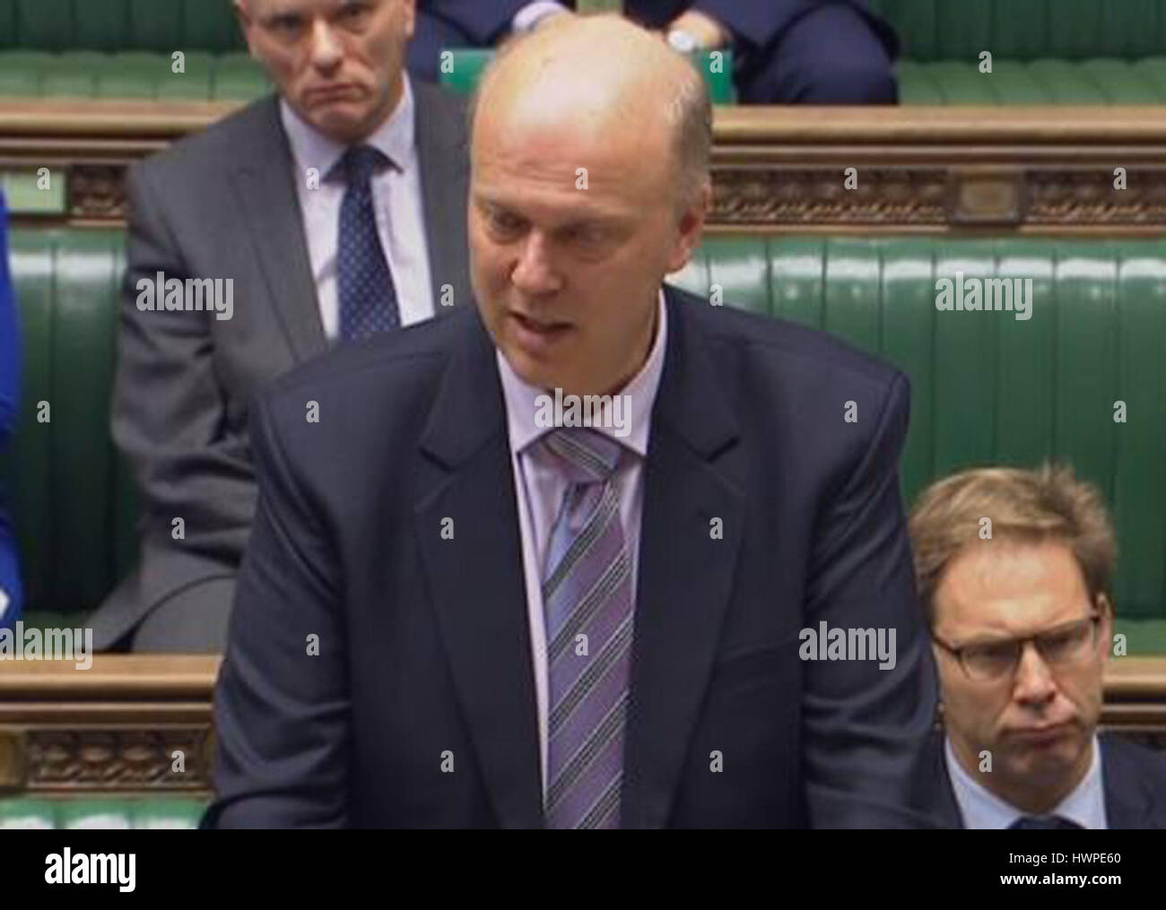 Transport Secretary Chris Grayling answers a question on aviation security in the House of Commons, London, following the decision to ban UK-bound airline passengers from taking laptops onboard flights from six countries. Stock Photo