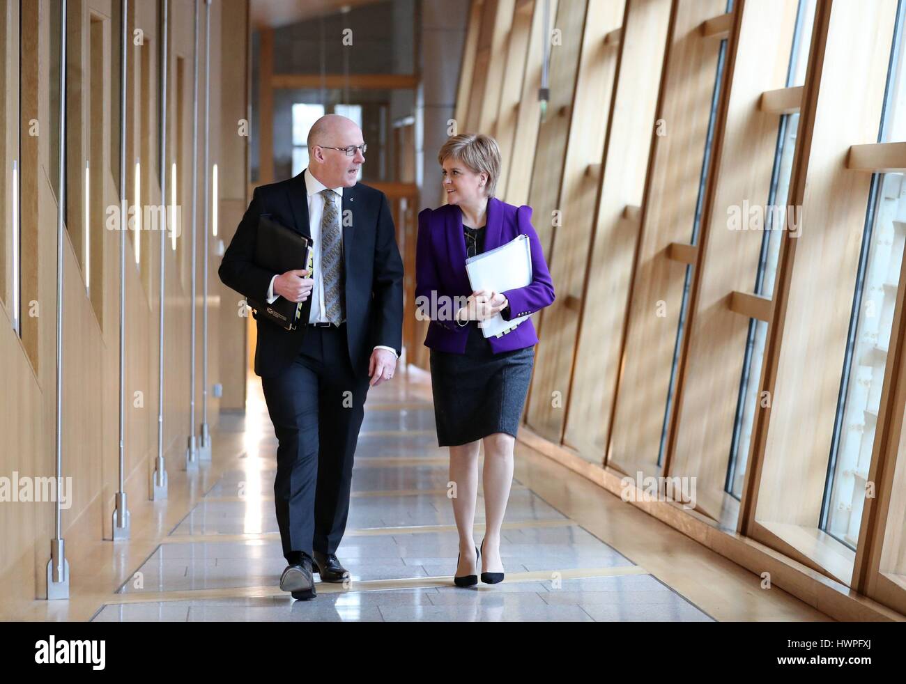 First Minister of Scotland Nicola Sturgeon and Deputy First Minister John Swinney, arrive at the Scottish Parliament in Edinburgh, ahead of the second day of debate on a potential second Scottish independence referendum. Stock Photo