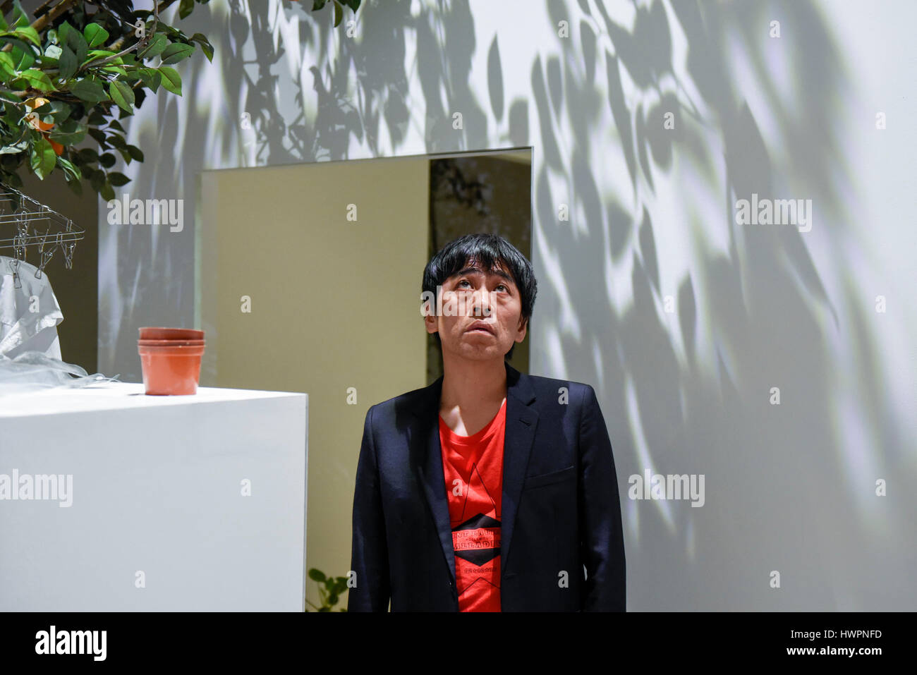 London, UK.  22 March 2017.  Pritzker-prize winning architect Ryue Nishizawa is seen inside a full size recreation of his Moriyama House, 2005.  Preview at the Barbican Centre of 'The Japanese House: Architecture and Life after 1945', the first major UK exhibition to focus on Japanese domestic architecture from the end of the Second World War to now.  The exhibition features designs from over 40 architects. Credit: Stephen Chung / Alamy Live News Stock Photo