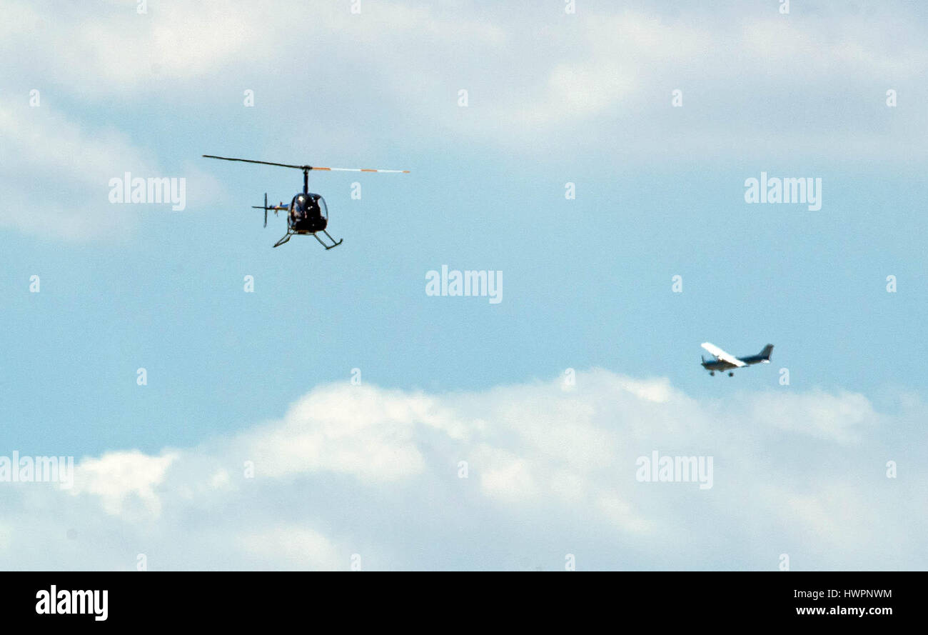 Lantana, Florida, USA. 22nd Mar, 2017. A helicopter takes off over Lake