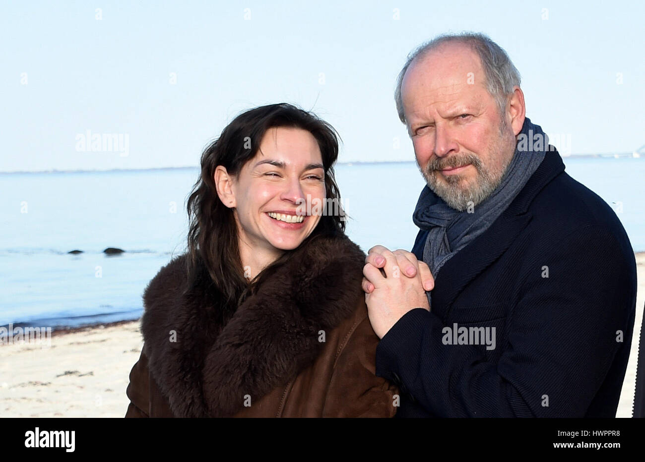 Heiligenhafen, Germany. 22nd Mar, 2017. The actors Axel Milberg and Christiane Paul during a photocall for the new NDR Tatort series episode 'Borowski und das Land zwischen den Meeren' (lit. 'Borowski and the land between the oceans') in Heiligenhafen, Germany, 22 March 2017. The episode will be aired in 2018. Photo: Carsten Rehder/dpa/Alamy Live News Stock Photo