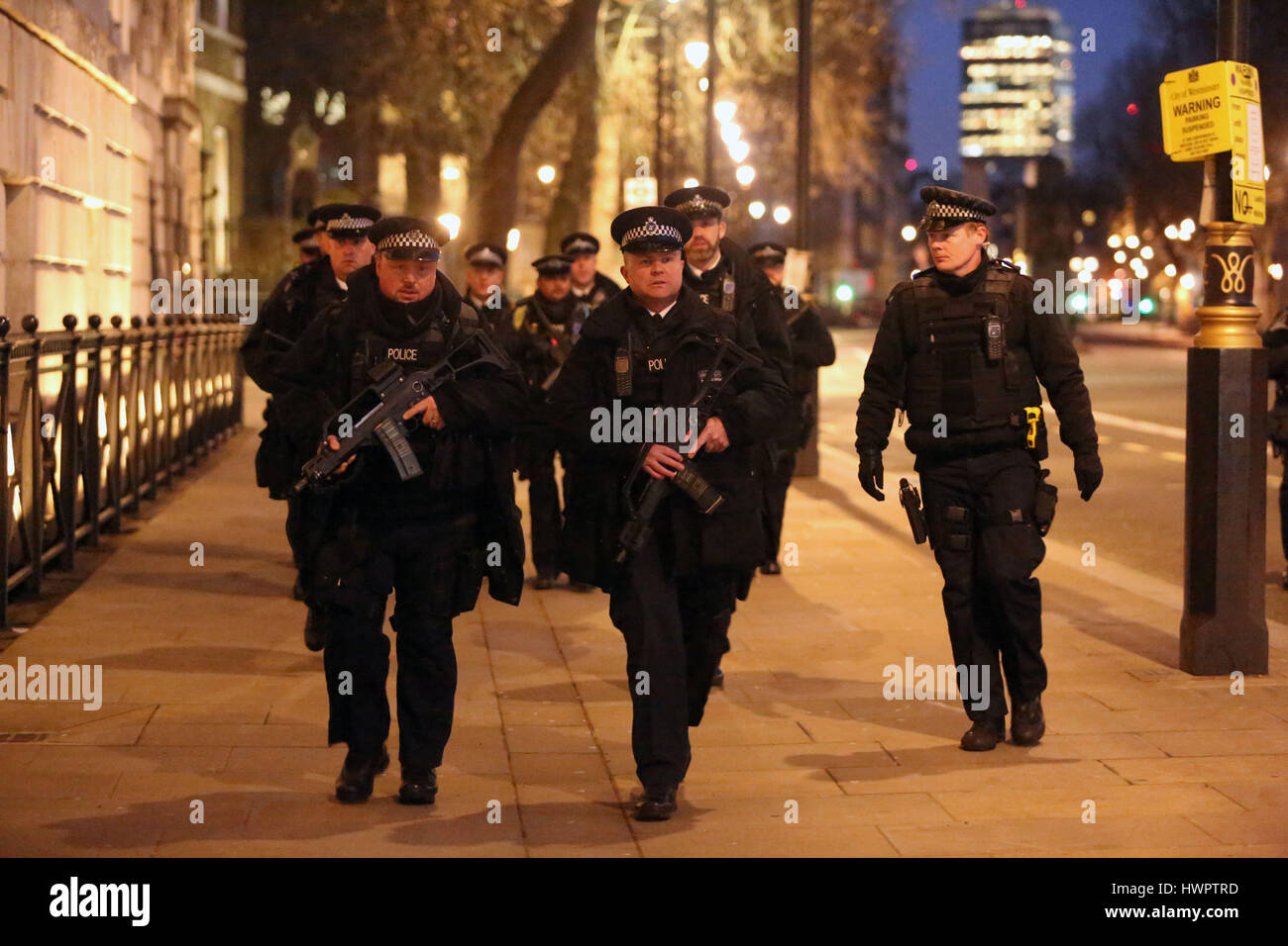 Heavily armed police have Whitehall in lockdown as night falls after the terror attack in Westminster today. Credit: Nigel Bowles/Alamy Live News Stock Photo