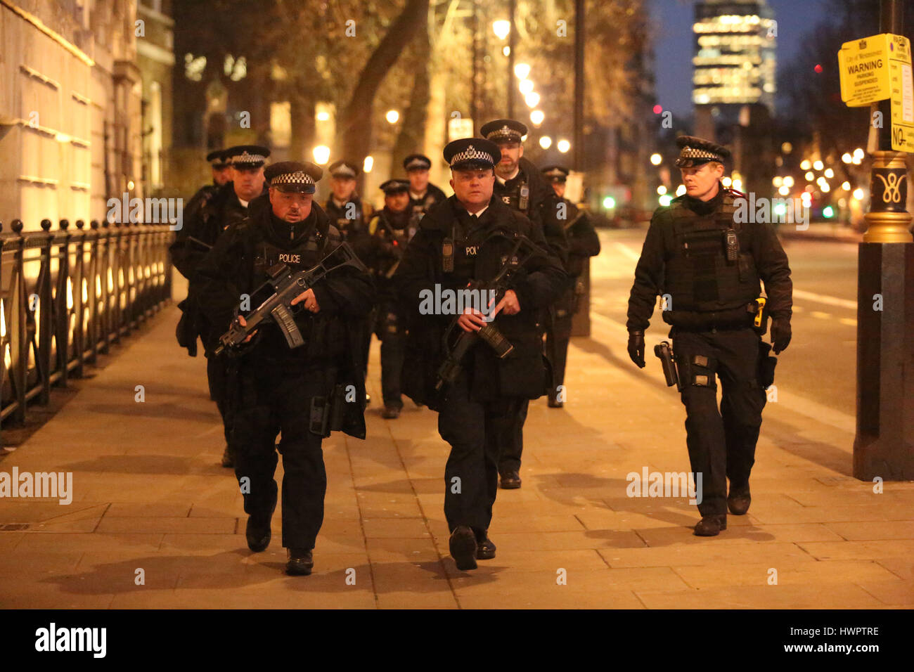 Heavily armed police have Whitehall in lockdown as night falls after the terror attack in Westminster today. Credit: Nigel Bowles/Alamy Live News Stock Photo