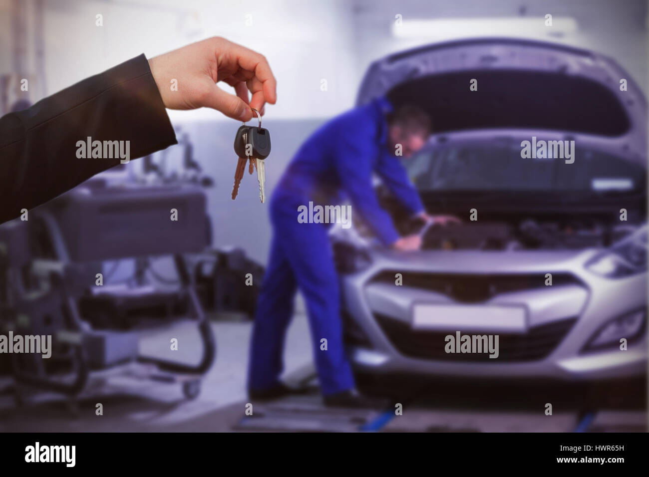 Male mechanic leaning engine hi-res stock photography and images - Alamy