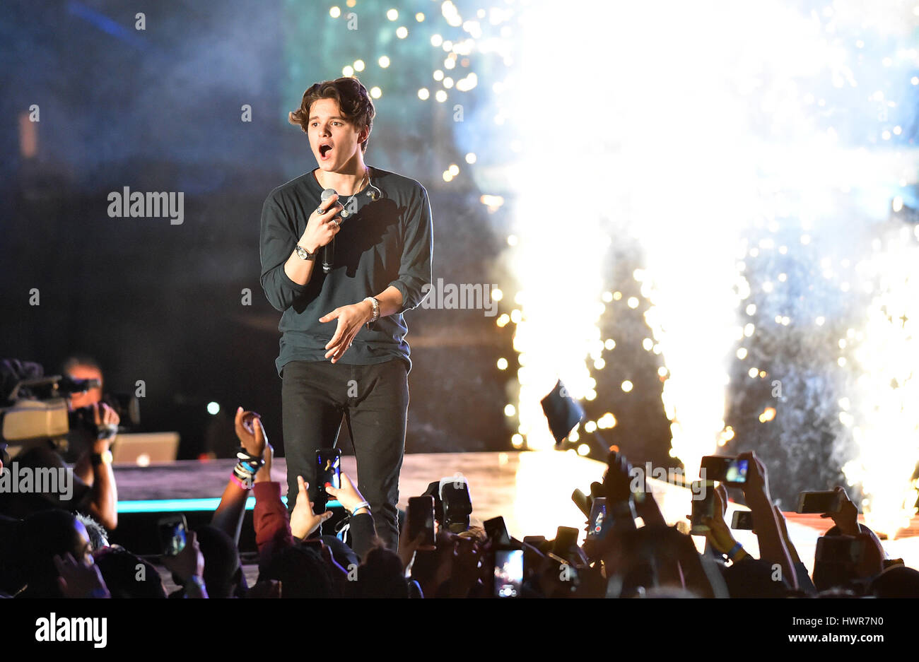 Brad Simpson of The Vamps on stage at the We Day UK charity event and concert, The SSE Arena, London. Stock Photo