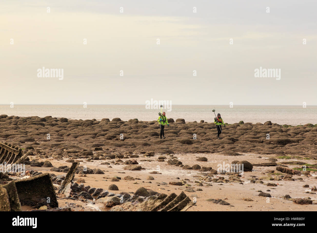 HUNSTANTON, ENGLAND - MARCH 10: Men from Environment agency taking GPS and Bathymetric readings during survey on Hunstanton beach. In Hunstanton, Norf Stock Photo