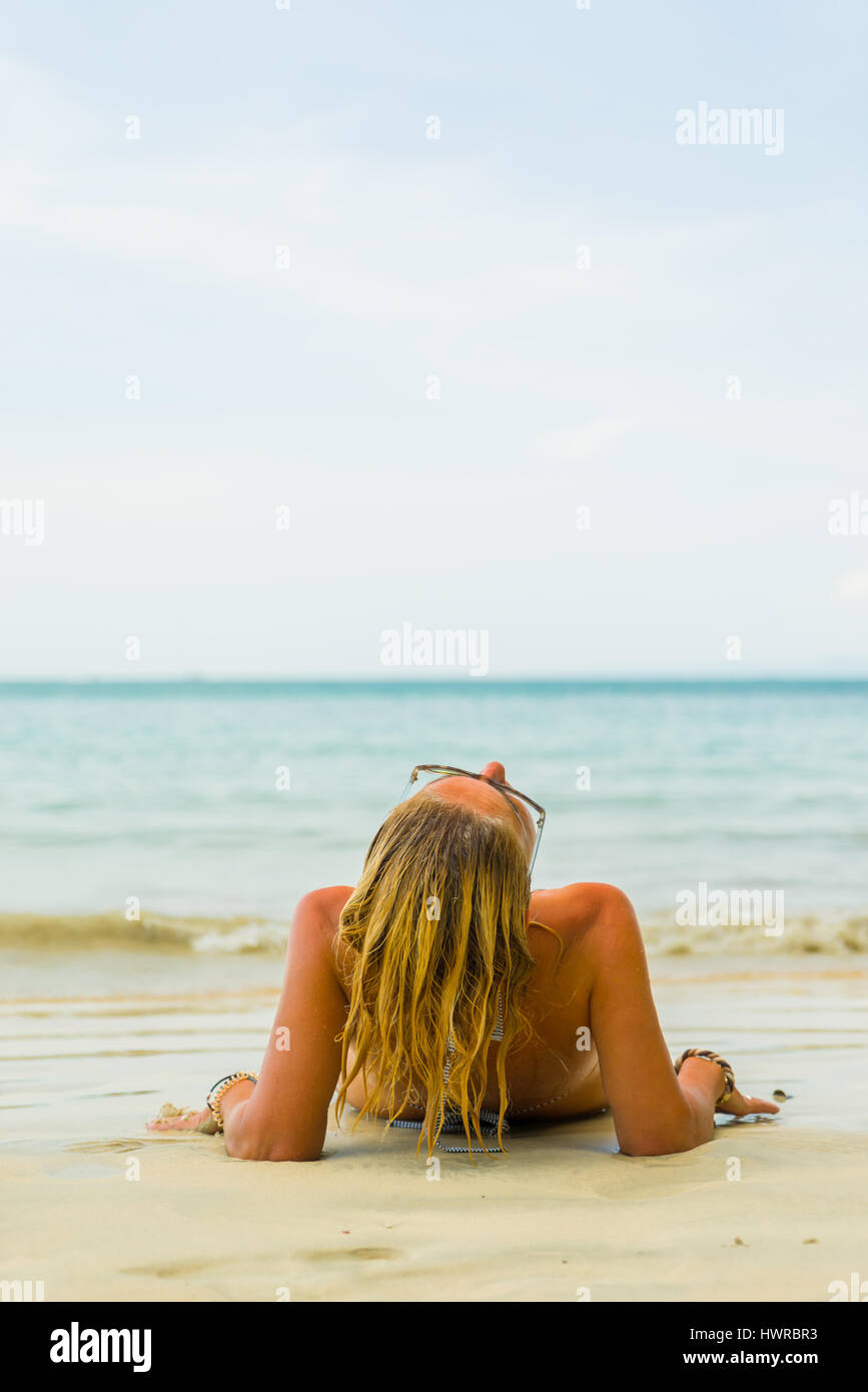 Elegant Woman in the White Bikini on the Sun-tanned Slim and Shapely Body  is Posing Near the Swimming Pool on Maldives. Stock Photo - Image of body,  bikini: 227583144