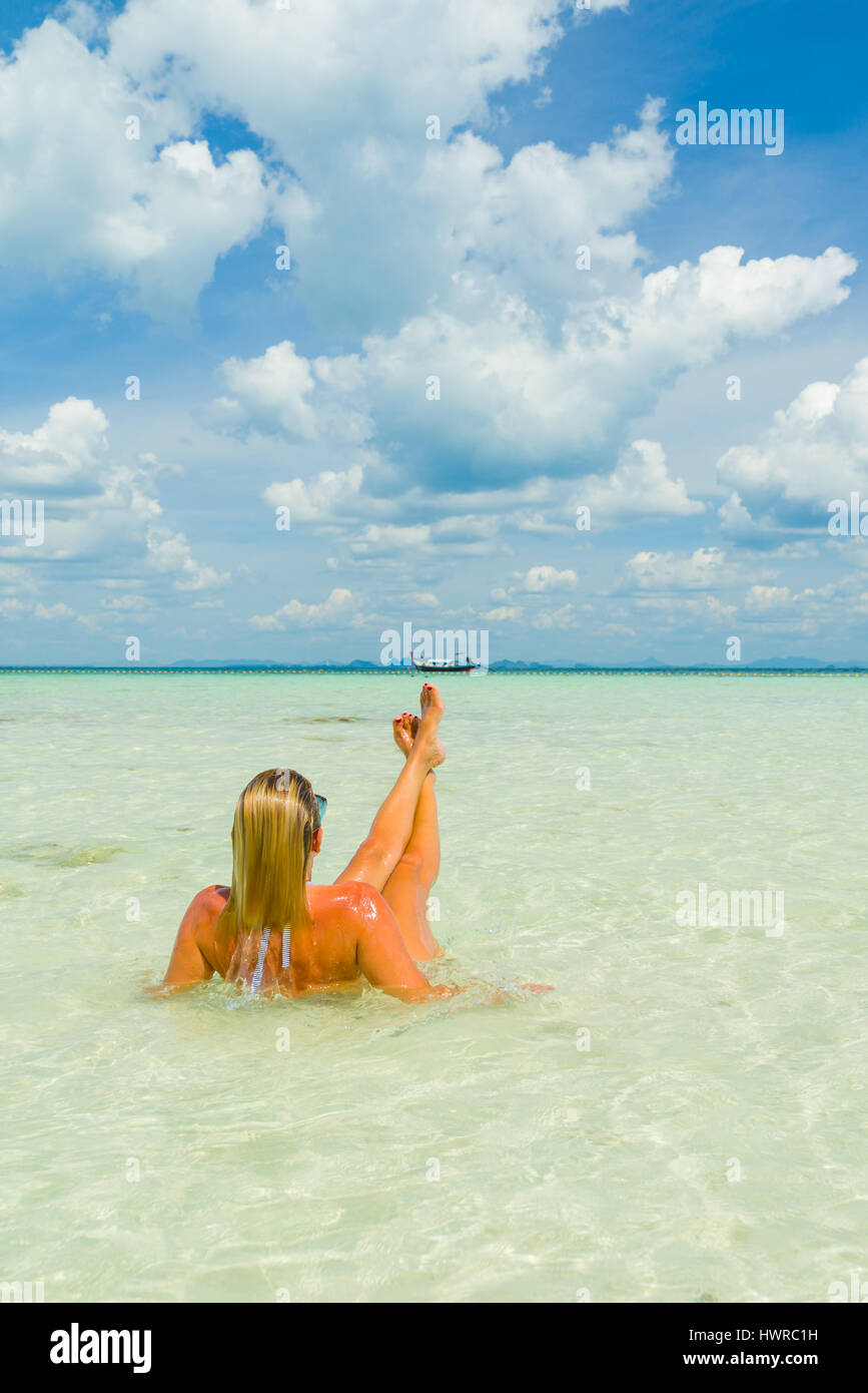 woman on the Thai beach of Poda island in Thailand Stock Photo