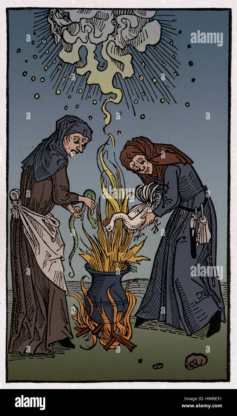 Witches brewing a spell in a cauldron, woodcut c. 1508 from 'De Lamiis et Pythonicis Mulieribus', tract on witchcraft by Ulrich Molitor Stock Photo