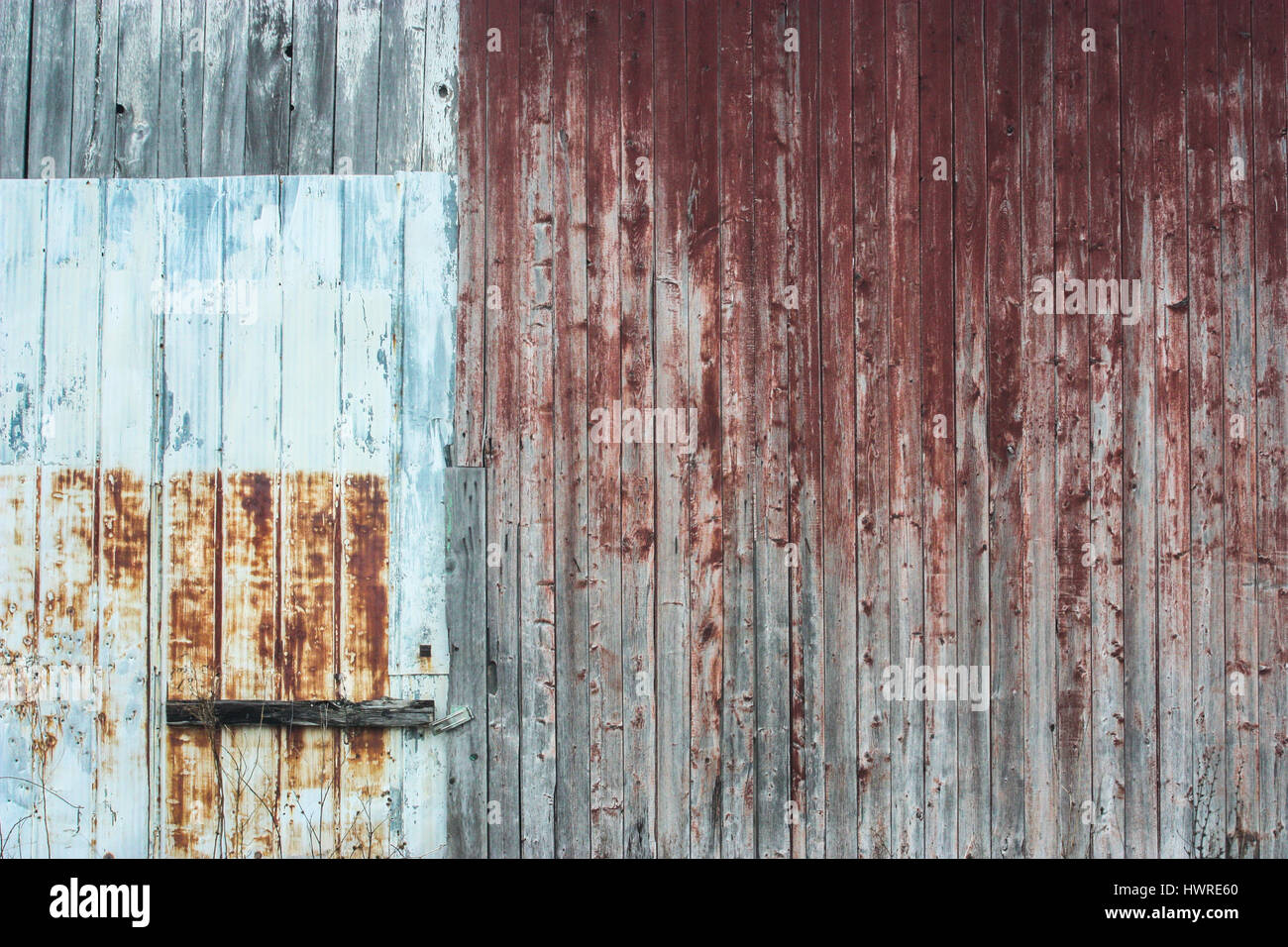 discolored farm door Stock Photo