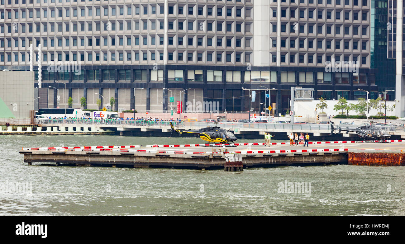 New York City, Usa - July 08, 2015: Helicopter an the Downtown Manhattan heliport. It is a helicopter landing platform at Pier 6 in the East River in  Stock Photo