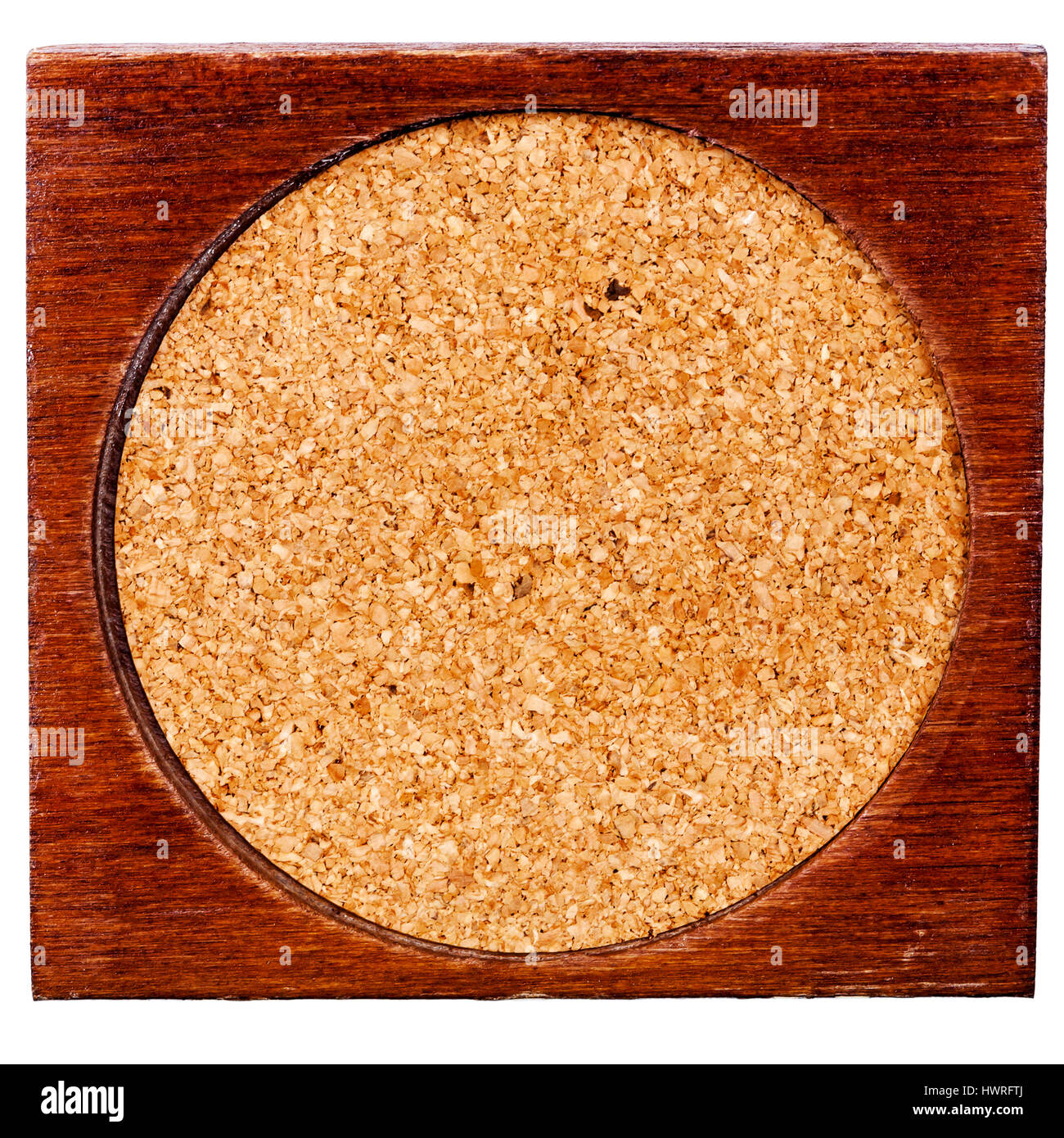 Old wood and cork table coaster isolated on white background Stock