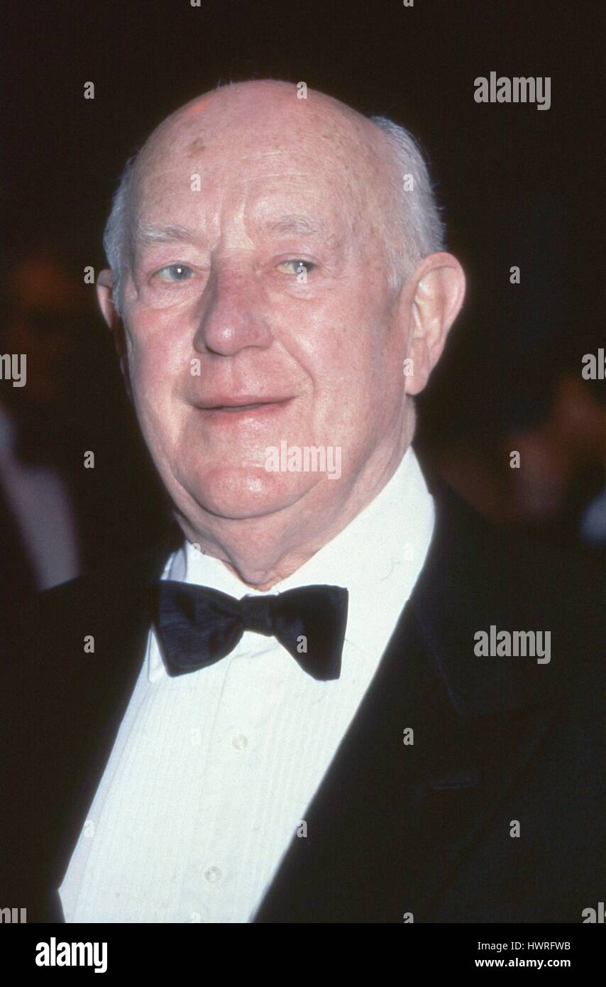 Sir Alec Guinness, veteran British actor, attends an awards ceremony in London, England in April 1991. Stock Photo